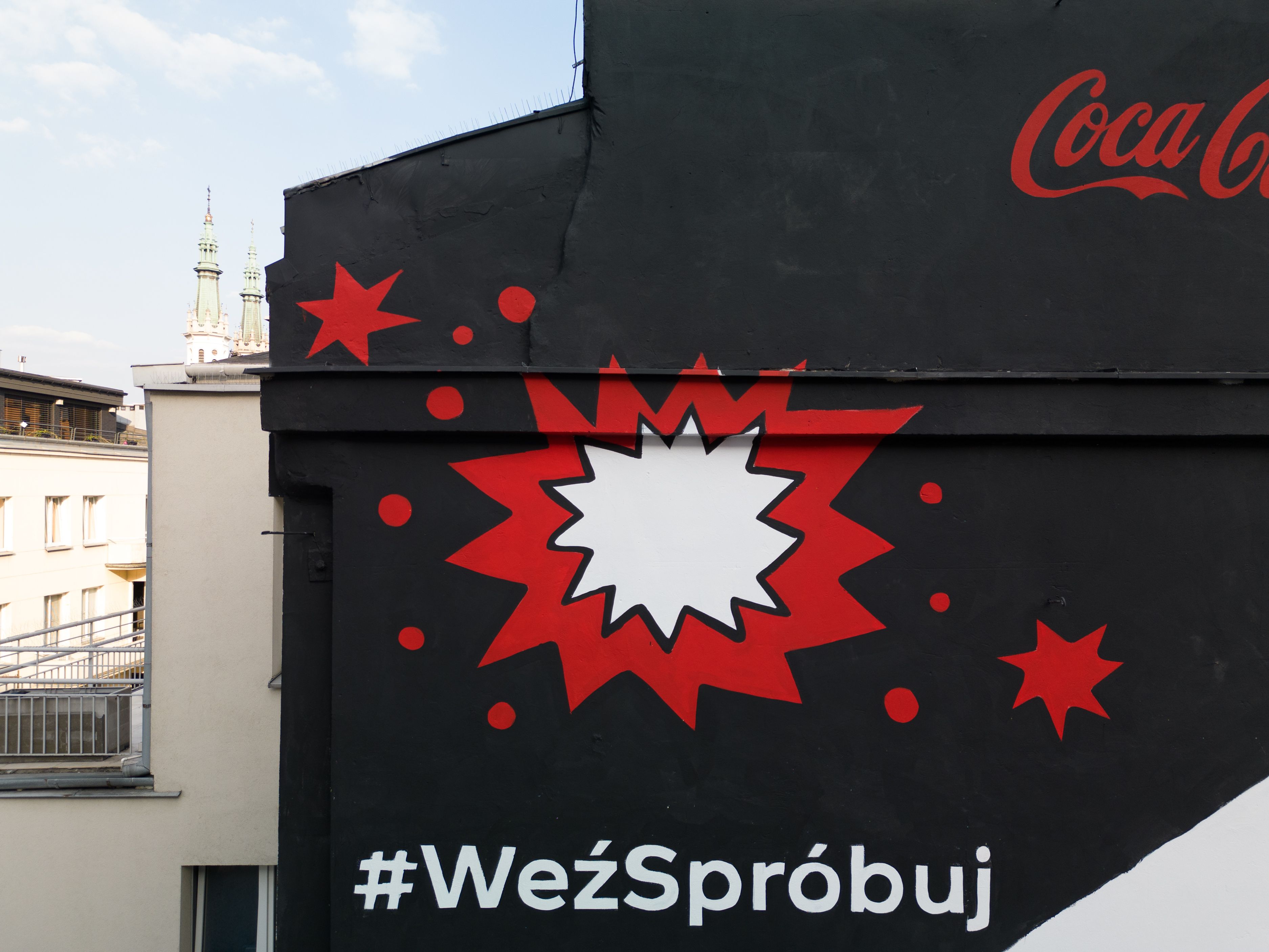 detale malowanego muralu dla coca-coli