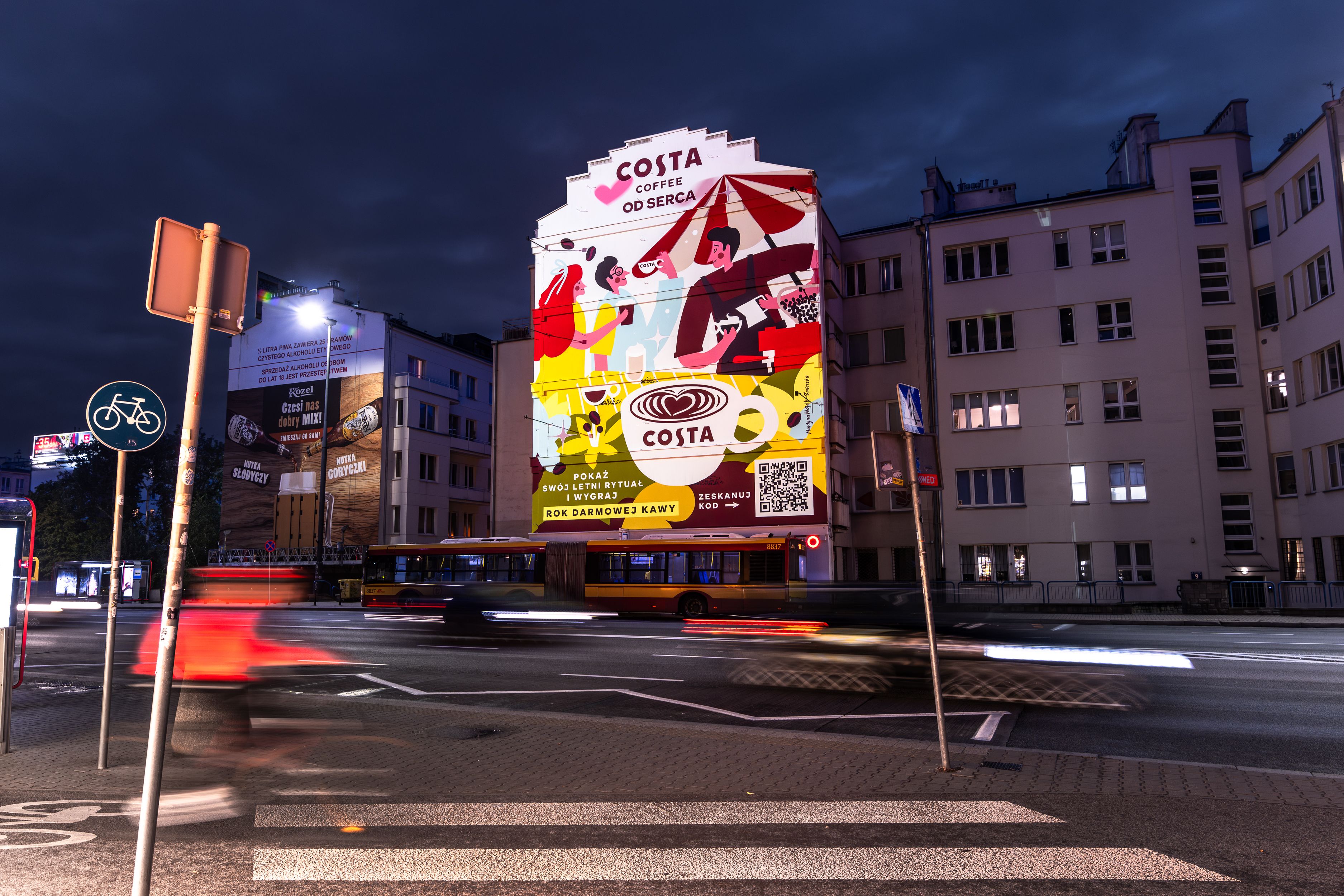 Nośnik reklamowy w przestrzeni miejskiej w Warszawie, ręcznie malowany przez Good Looking Studio.